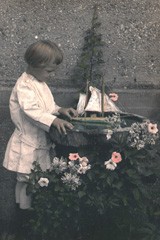 Toy Sailboat in Birdbath