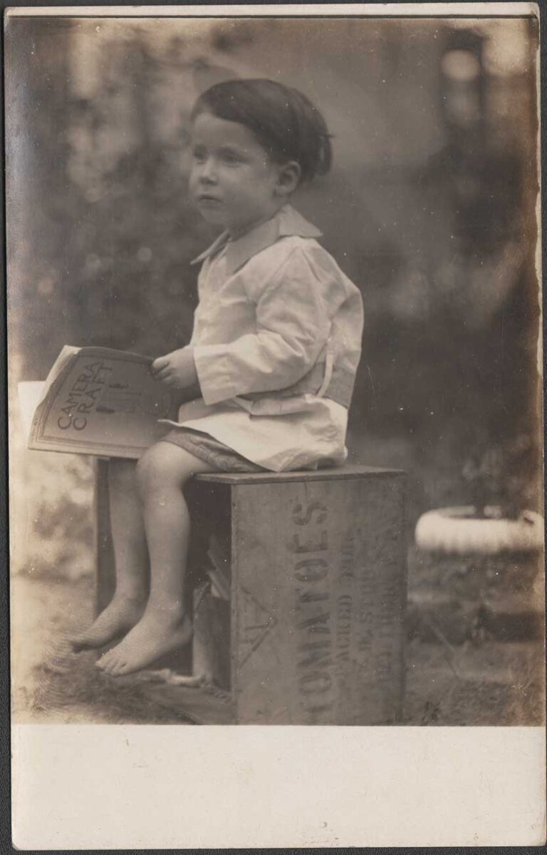 Child Sitting on Tomato Crate Holding Camera Craft Magazine