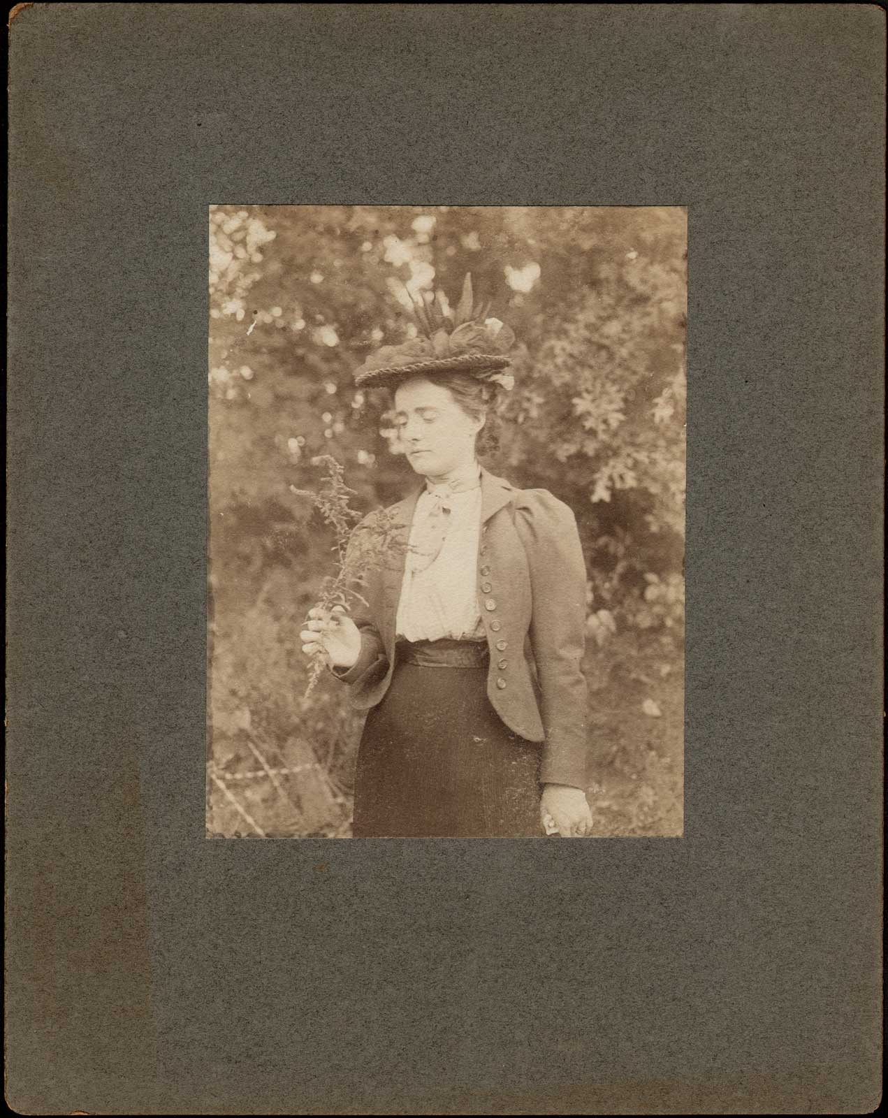 Woman Holding Goldenrod