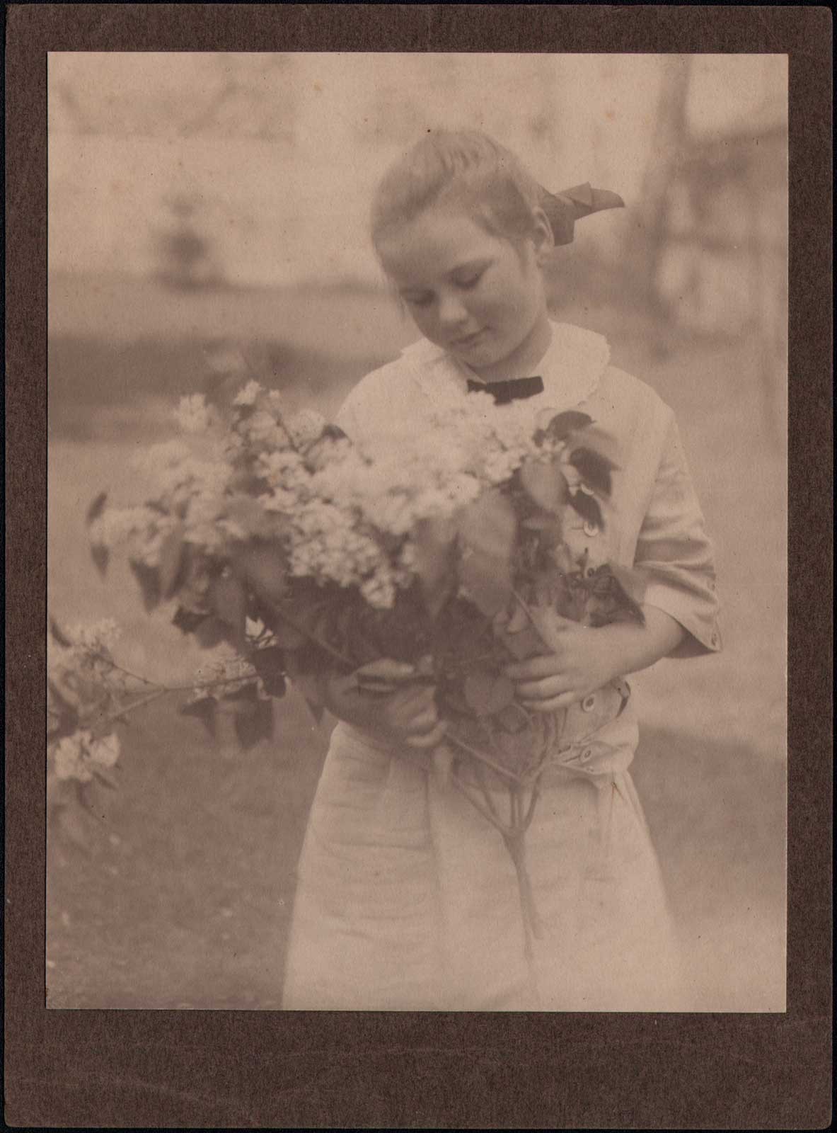 Girl Holding Bough of Blossoms ✻