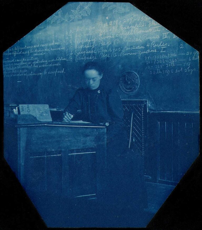 Schoolteacher at Desk