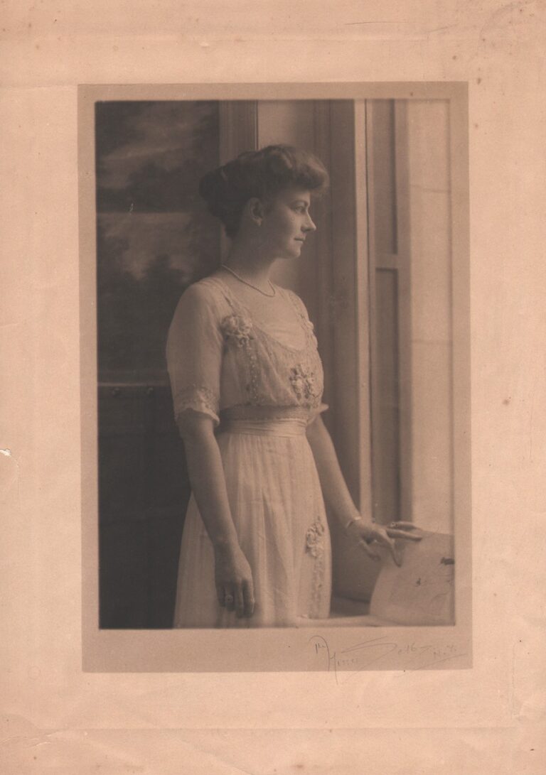 Woman Looking out Studio Window